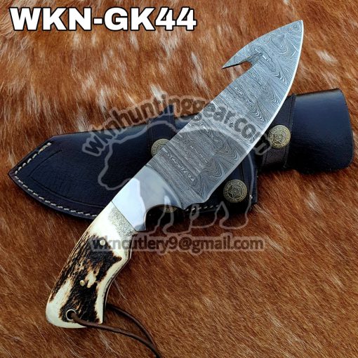 Custom Made Damascus Steel Fixed Blade Gut, Hunting and Skinner Camping knife. With Right Handed Sheath To Rest On Back Belt.