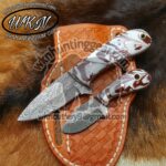 handmade damascus steel cowboy knives.
