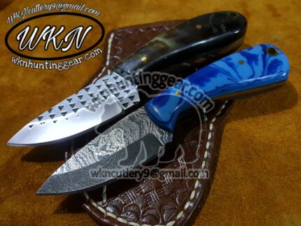 handmade damascus steel cowboy knives.