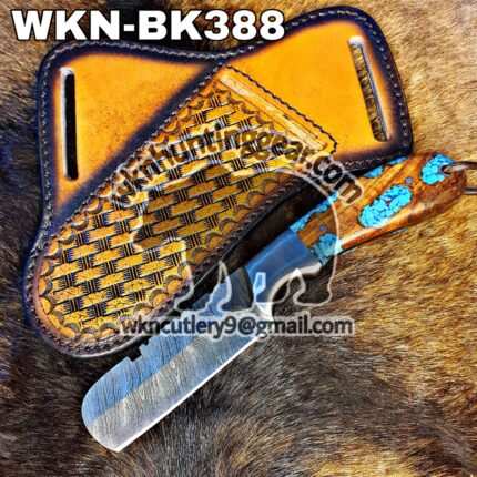 Custom Made Damascus Steel Fixed Blade Western Bull Cutter knife. With Right Handed Sheath To Rest On Back Belt.
