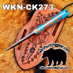 Close-up of an orange stitched leather sheath with a knife, turquoise inlays, set on brown fur; bold 'WKN-CK273' text and a bear silhouette with 'wk hunting gear' branding.
