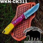 Colorful fixed-blade knife with a blue Damascus-patterned blade on an orange leather sheath outdoors, branding for wknhuntinggear.com