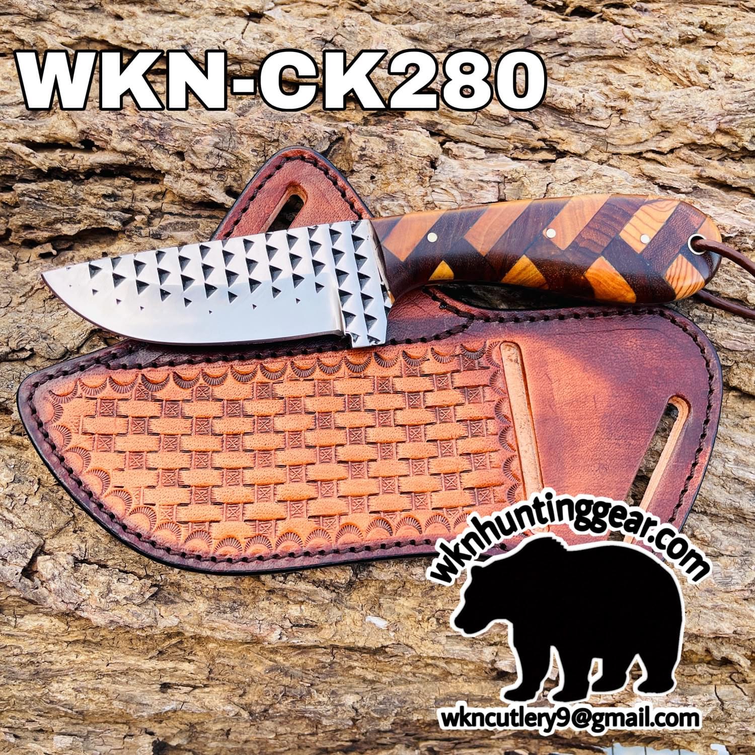 Fixed-blade knife with a patterned wooden handle on a brown leather sheath, resting on a rocky surface; product code WKN-CK280.