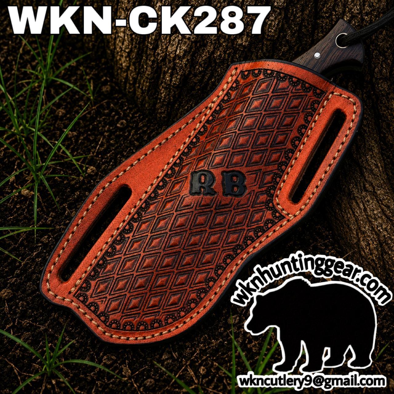 Leather knife sheath with a diamond pattern on dirt, featuring 'RB' initials and orange stitching; product branding 'WKN-CK287' visible at top left.