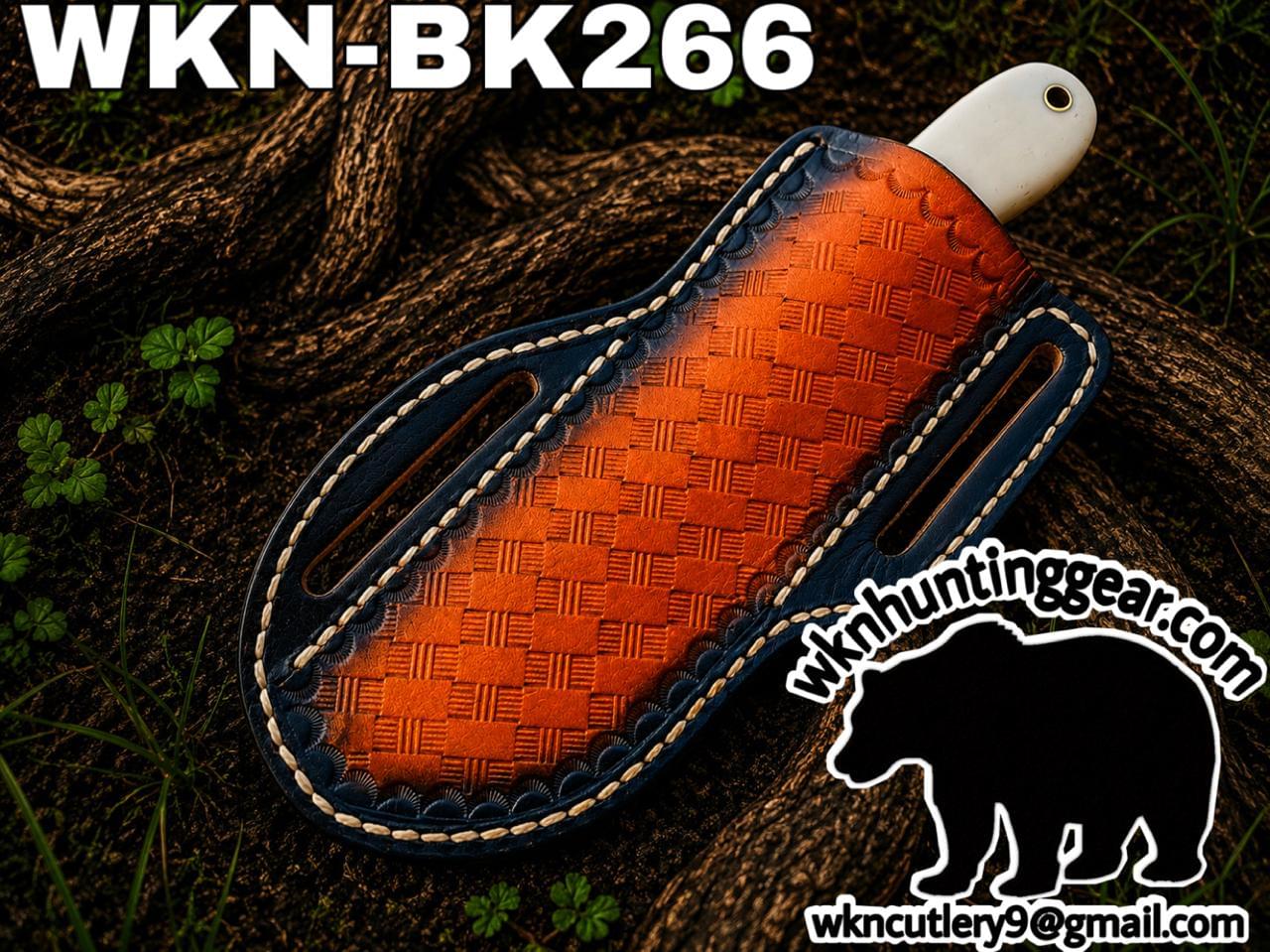 Orange-and-navy woven leather knife sheath on a tree stump, with large 'WKN-BK266' text and a bear logo at the corner (wknhuntinggear.com).