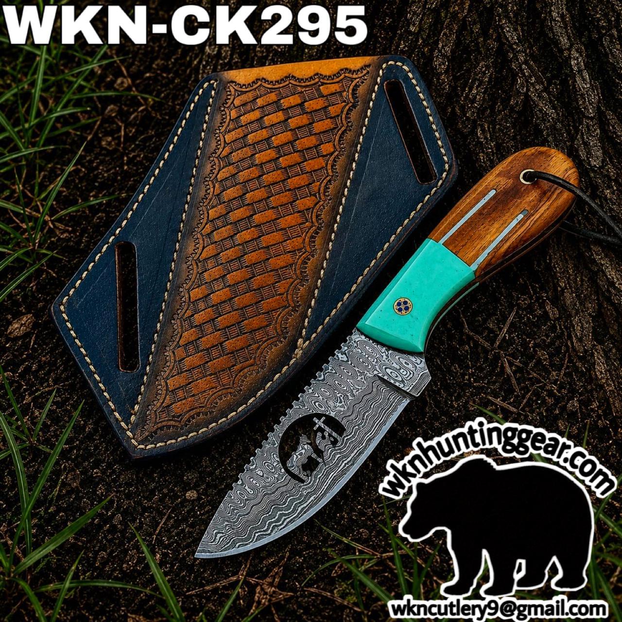 Damascus fixed-blade knife with a turquoise handle beside a brown stitched leather sheath on dirt outdoors, branding WKN-CK295 visible.