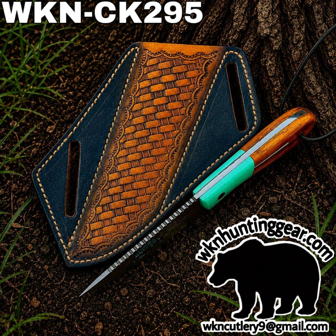 Leather knife sheath with blue edges on dirt next to a fixed-blade knife; hunting gear logo in the corner.