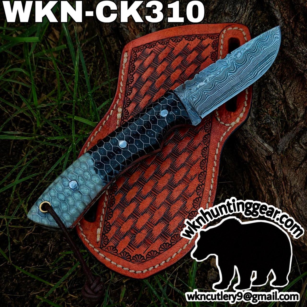 Damascus-pattern knife on a carved red leather sheath; features WKN-CK310 and wknhuntinggear.com with a bear logo.